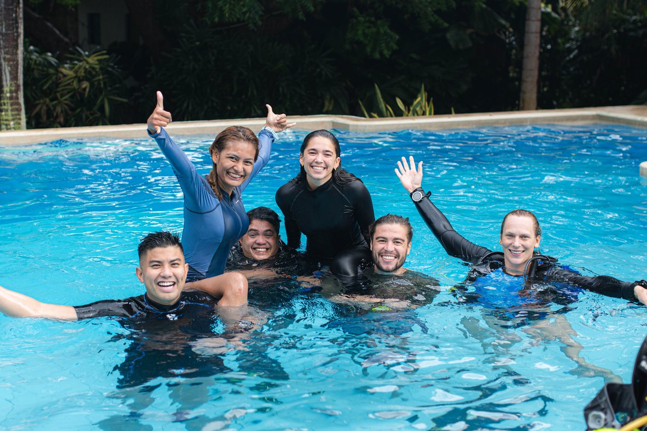 PADI IDC candidates in water enjoying the summer